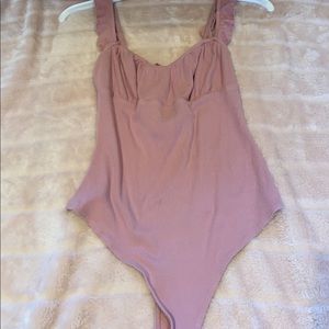 Baby pink bodysuit by Lelis